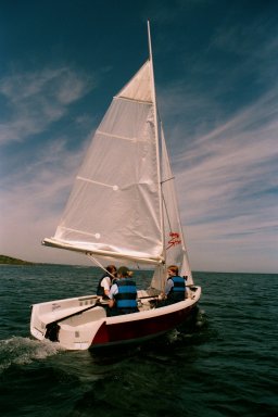 Beginners enjoying their first taste of sailing the club's Laser Stratos without an instructor on board